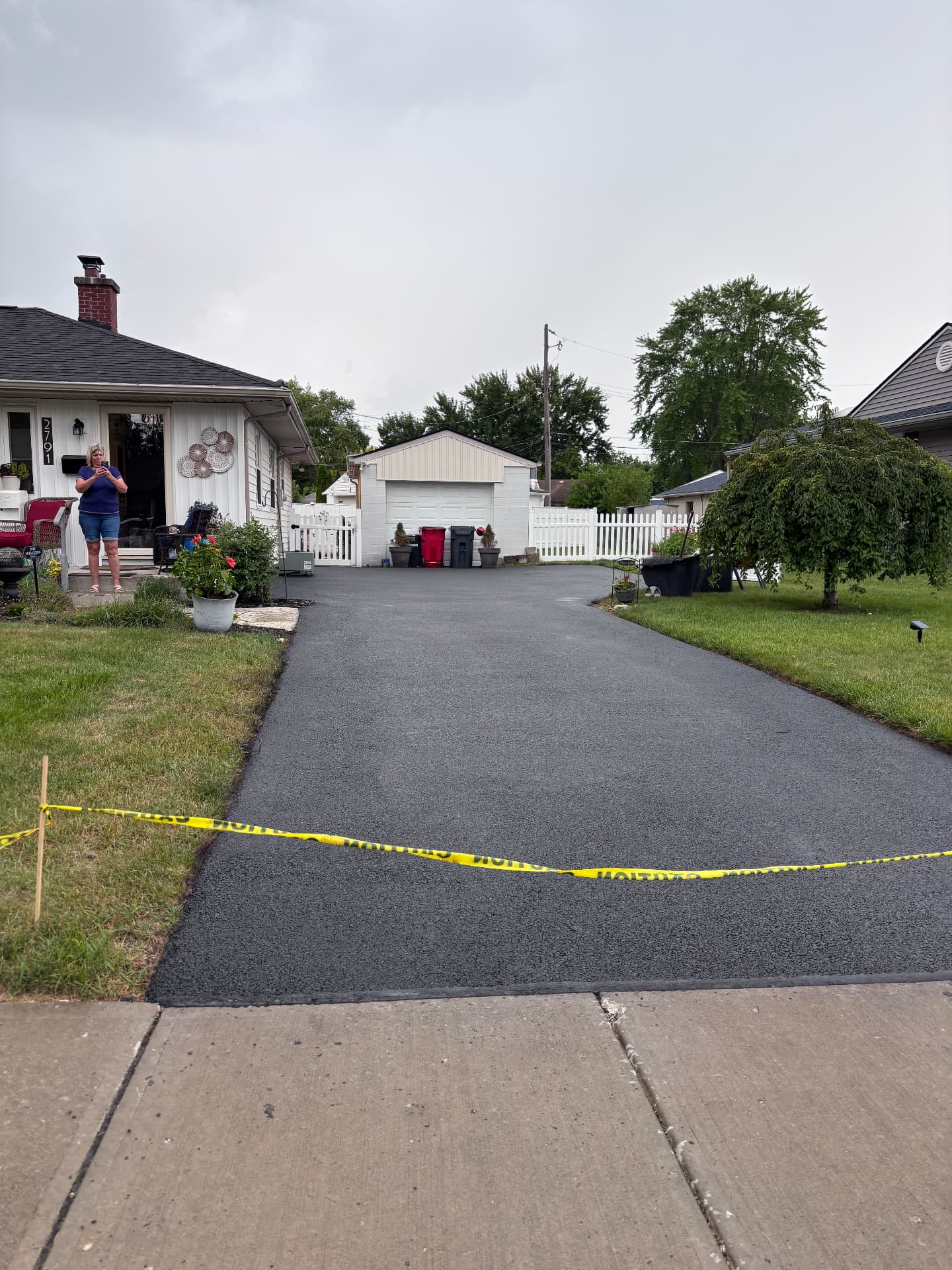 Driveway after CrownCoat premium oil-based sealant
