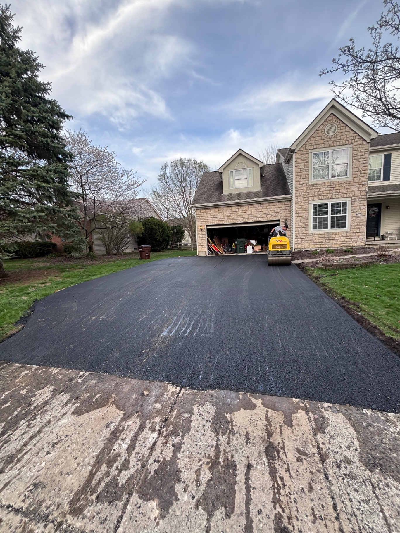 Driveway after new asphalt installation