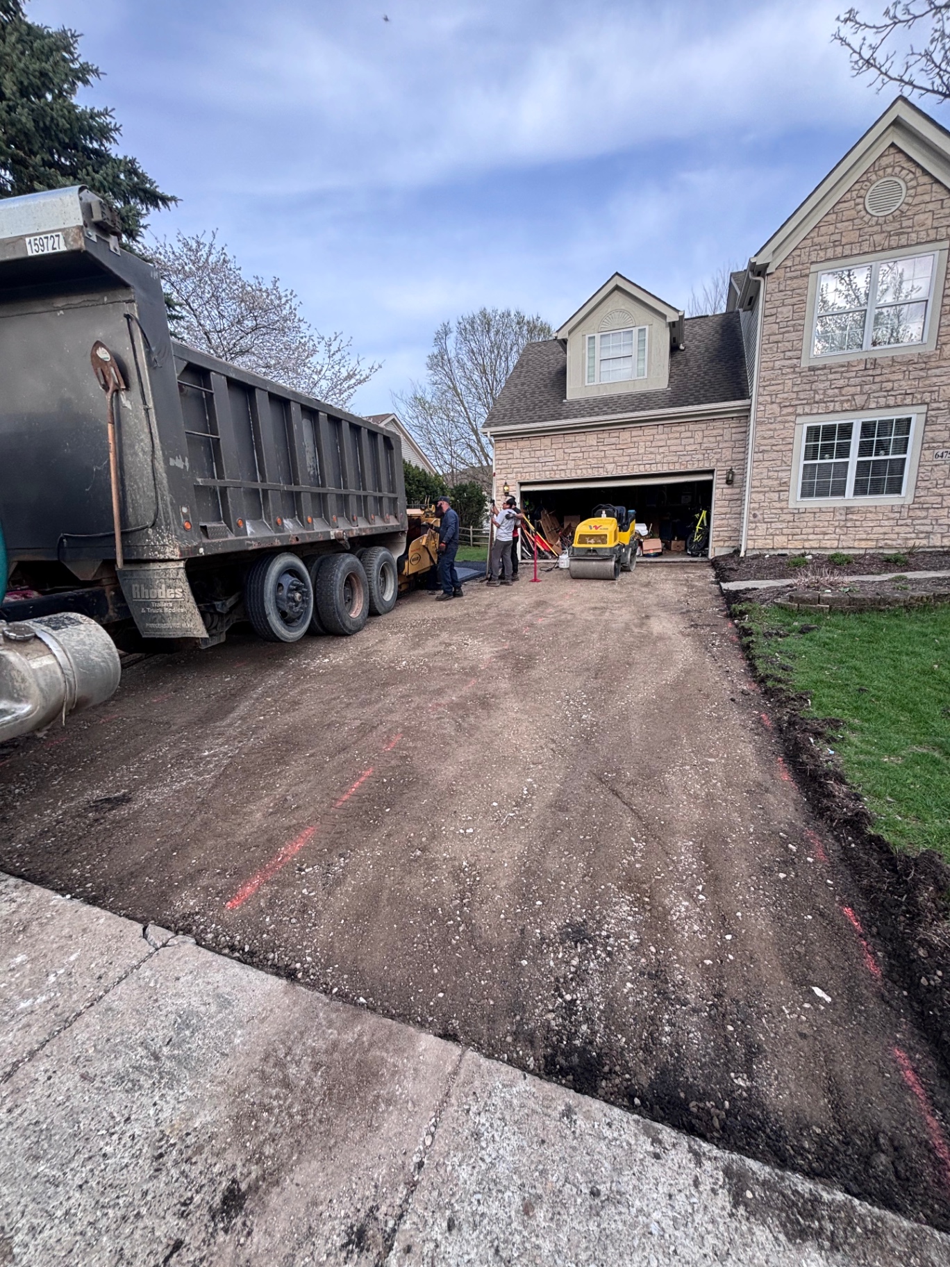 Driveway before new asphalt installation